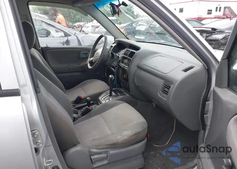 2000 Chevrolet Tracker Hard Top from USA, damaged, VIN 2CNBJ13C1Y6945846